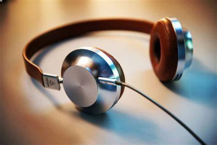 How has the music industry been affected by the Internet and digital downloading?